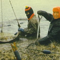 Lawrence on right -Harvesting LIVE CATFISH the hard way the Christmas holidays,1967 (in his glorious hat!)