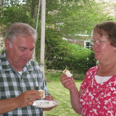 John encouraged his mom to feed Len the cake enthusiastically....but I think she was too sweet and gentle