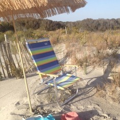 Mom's beach chair and beach umbrella.