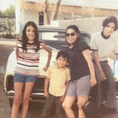 Leonard with mom-Joanne, MaryAnn and David in the driveway in Santa Fe