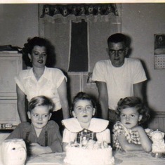 Mom, Dad, Leroy, Barb & Janet.  Barb's birthday, this is in the kitchen of our home when we lived on 2nd and National.