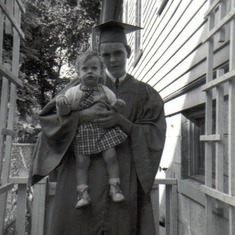 Leroy's Graduation, holding Tina in our side yard.