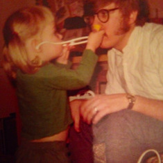 Getting a checkup from daughter Julia circa 1971 (approx)