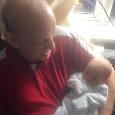 Dad meeting his great grandson for first time 