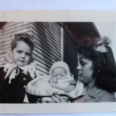 Linette and Lola Jean, holding cute little bundle Vicki.