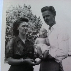 Proud parents, Violet and Thurman with their new baby boy, Denny.