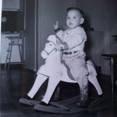Garet and his rocking horse, already going places!