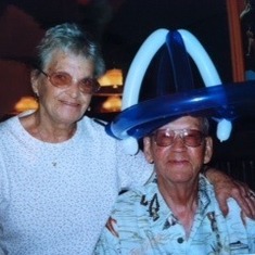 "How do you like my balloon hat Viv" Les and Viv still laughing it up.
