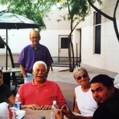 Mydni, Jule, Les, Viv, Carlos (Myndi's husband) and Matt, gather outside on a patio in Phoenix.