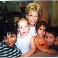 Sandi with the great-grandchildren; Fernando, Alexis, Serena and Caleb.