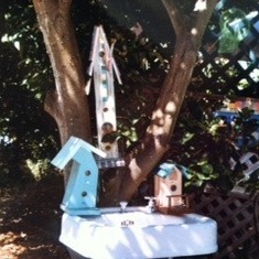 Les' colorful creative "one of a kind" bird houses.
