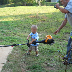alex helping fix the weed eater 007