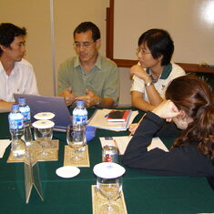 Busy talking EAAF Network site management at the 11th MWCC meeting in 2006