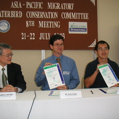 Proudly displaying certificates of latest network sites at 8th MWCC meeting, 2003