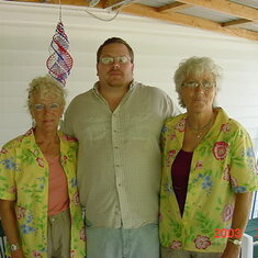 My mother on the right and her twin on the left with their great nephew Rob Miller in the center.  Mom and her twin Aunt Fay always like to dress alike at our family reunions.  Truth be know, Aunt Fay picked out the dress attire and my momma went along!