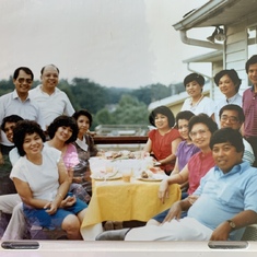 Taken at the Hernandez Residence in Baltimore. Lai is in red, seated on the right. I am behind her. 