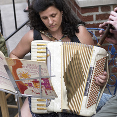 Lillian playing the accordion at the Windsor Place Block Party.