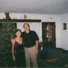 Mom and Dad getting ready to head off to the company Christmas party.