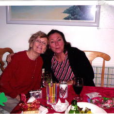 Mom and Aunt Dolores. Uncle Bob's face is at the lower left.
