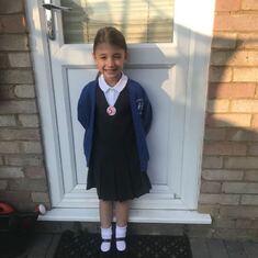 Renée in her new school uniform ready for her first day at school, her birthday 6th September 2018.