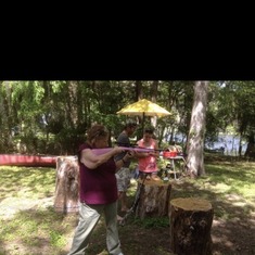 Shooting the pink gun at the cabin