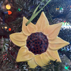 I painted this sunflower ornament when Lisa and I visited a "paint your own pottery" shop in KS :)