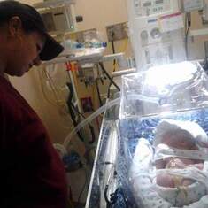 Momma and my first daughter in the nicu