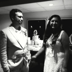 Only bad picture out of the bunch. Came out black and white. Cutting of the cake. 