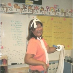 Lisa at Neil Cummins school for Halloween 2004, letting the kids wrap her in toilet paper so she could be the mummy. This was the year Jen was in kindergarten. Thanks Sheri for finding the pic.