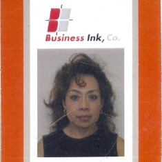 Li's access badge for work at Business Ink.