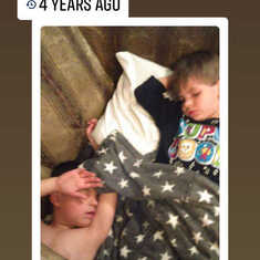 Logan and his little brother Dominic asleep Christmas Eve