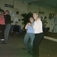 Mom dancing with her sister, Janet Rambo. The dip looks a little dangerous.