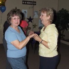 Mom and Janet dancing.