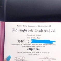 Lolita’s youngest son Shamon’s high school diploma (watching over him as a proud mother would)
