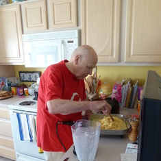 Dad making his famous scrambled eggs Aug 2015