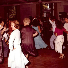 Lorett loved to dance! I have no idea where this was taken but that;s her sister Delphine in the print dress in front; Lorett's the lady in white.
