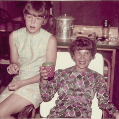 Niece Annette with Lorett. What's in the cup Ma? ;-) 1970