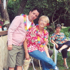 Luau.  Mom and Mark, can you believe it?  Auntie Eileen in the background, No, she can't believe it.