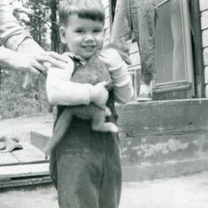 Tommy Taylor with mommas helping hands somewhere in Woodland Park, Co. with a cat.