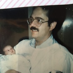 December 10th, 1974 - Lou holding his baby girl, Gina Marie, for the first time after her delivery. Such a strong bond from day 1!