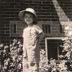 Lou as a little boy playing in the backyard of his Denver home off of 44th and wyandot.