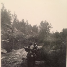 Dad/Lou as a young boy fishing. Fishing was another love of Lou's.