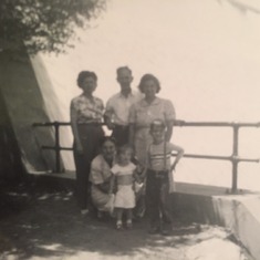 Lou as a little boy with his parents and friends at some reservoir...