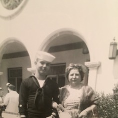 Dad/Lou as a young man in the Coast Guard   with his Mother, Nettie. Boot Camp Graduation? San Francisco, CA. 1964?