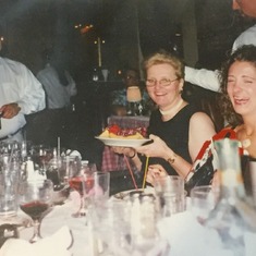 Gina's College Grad Dinner-Maggianos. Lou/Dad cracking us all up! August 1999.