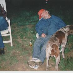 Dad doing everything he loved! Sleeping on a hunting trip with his beloved dog, a beer and his shotgun! :-)