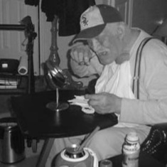 Dad cutting mustache. He said he wanted to look pretty.