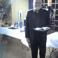 Father Dennis Wait @ dad's Celebration of Life giving his blessing.