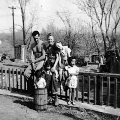 Dad baby girls and neighbors (Jerry and Connie).