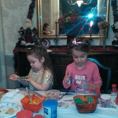 Marie's grandchildren Bella and Shelby.  Christmas 2015 decorading cookies.